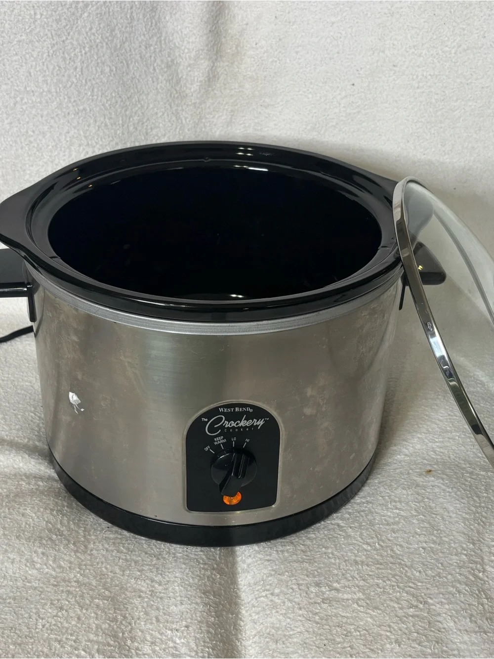 West Bend Crockery Stainless Steel Slow Cooker in Black and Silver